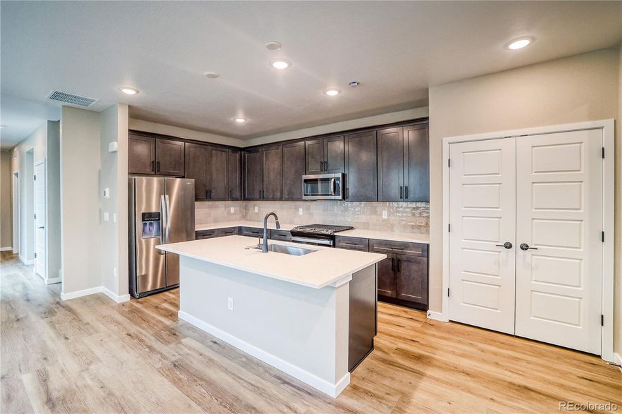 Furnished interior view inside a new home in Painted Prairie, Aurora (Image 12).