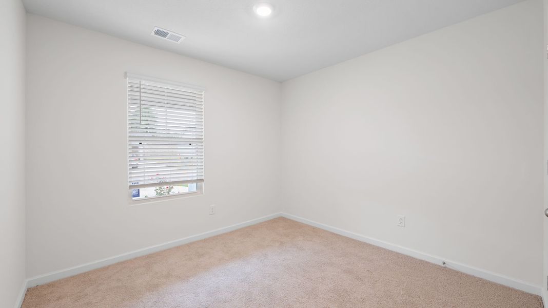 Representative unfurnished interior of a home built from the Lewis by D.R. Horton in Crescent Ridge, Niota (Image 13).