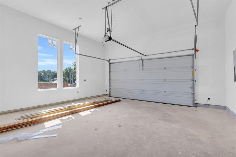 Garage with baseboards Garage with baseboards