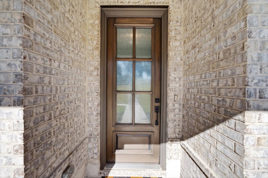 Exterior details and patio area of a home in Oak Grove Addition, Springtown (Image 4).
