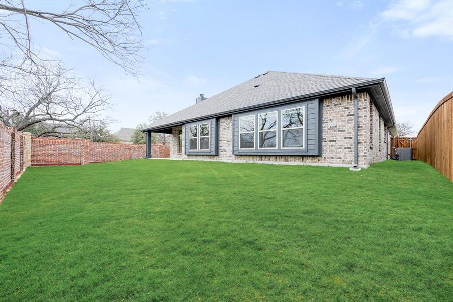 Exterior details and patio area of a home in Grace Park, Bedford (Image 21).