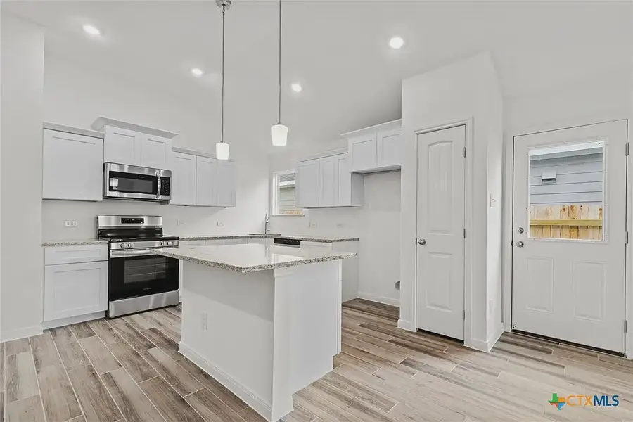 Representative furnished interior of a home built from the Robin 34NMTR3CG by Saratoga Homes in Turnbo Ranch, Killeen (Image 3).