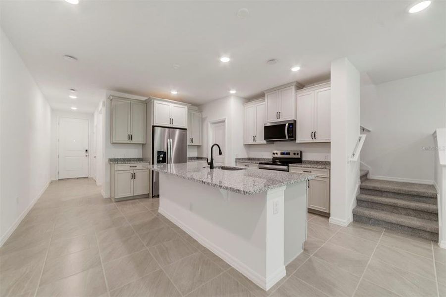 Furnished interior view inside a new home in Towns at Greenleaf, Oviedo (Image 6).