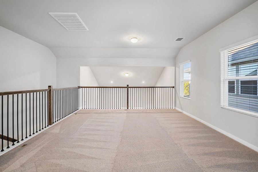 Representative unfurnished interior of a home built from the Granbury by Ashton Woods in The Trails at Carmel, Pflugerville (Image 53).