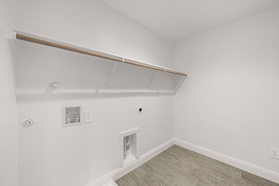 Representative exterior photo of a completed home built from the Brownwood by Impression Homes in Main Street Village, Mansfield, TX (Image 24). Representative exterior photo of a completed home built from the Brownwood by Impression Homes in Main Street Village, Mansfield, TX (Image 24).