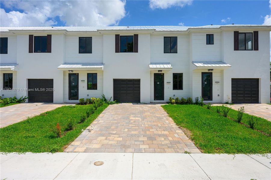 Front exterior of a new home in , Florida City, FL, highlighting curb appeal (Image 26).