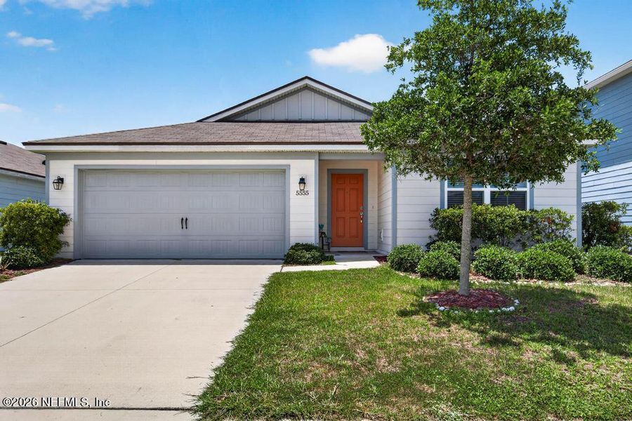Front exterior of a new home in Wells Landing, Jacksonville, FL, highlighting curb appeal (Image 2). Front exterior of a new home in Wells Landing, Jacksonville, FL, highlighting curb appeal (Image 2).