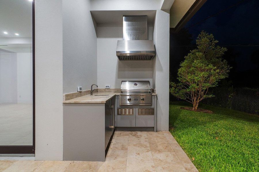 Exterior details and patio area of a home in , Delray Beach (Image 34).