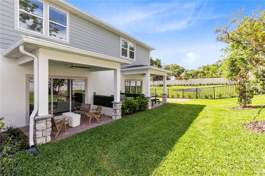 Exterior details and patio area of a home in Oviedo Square, Oviedo (Image 21).