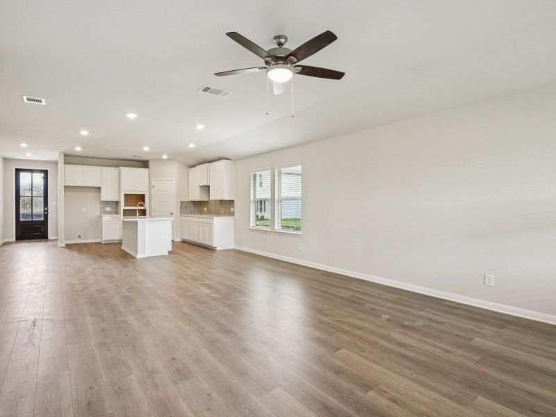 Living and dining room in the Oleander floorplan at a Meritage Homes community.