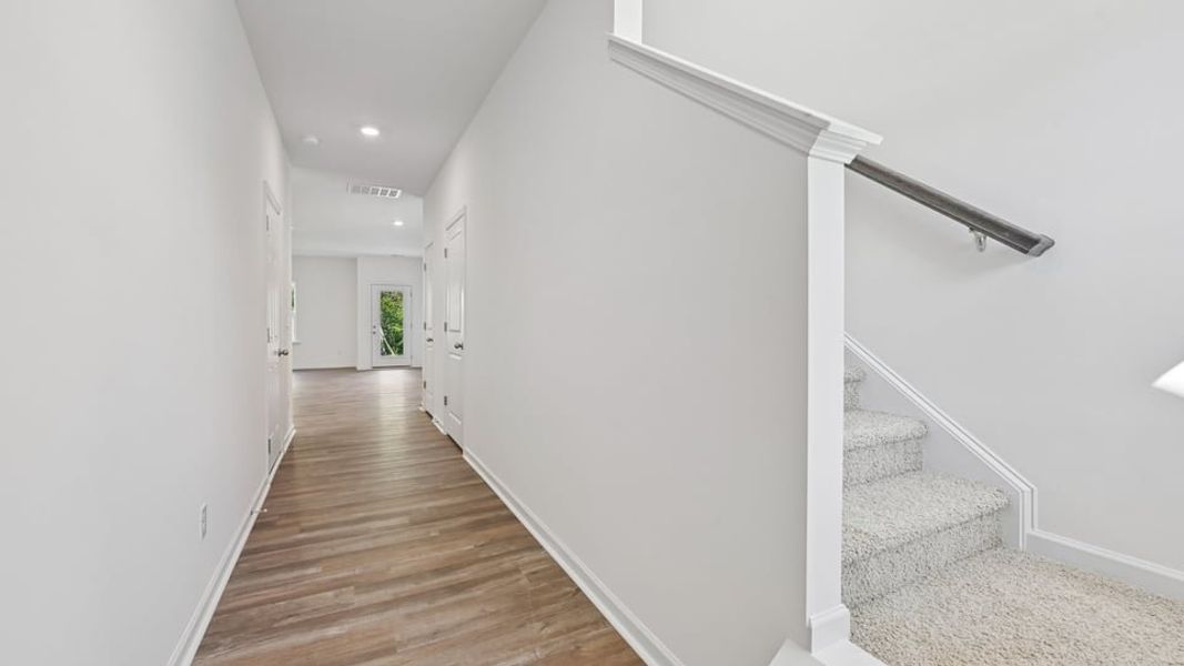 Spacious, unfurnished interior of a new home in The Townes at Belle Grove, Wendell (Image 6).