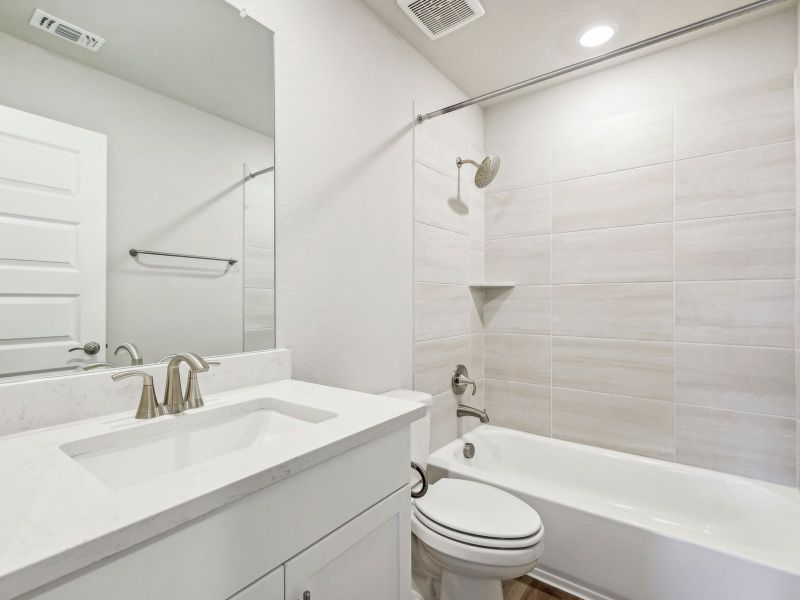 Furnished interior view inside a new home in Riverbend at Double Eagle - Boulevard Collection, Cedar Creek (Image 5).