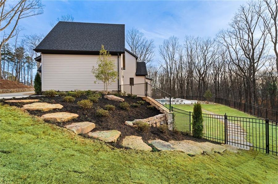 Front exterior of a new home in , Canton, GA, highlighting curb appeal (Image 33).