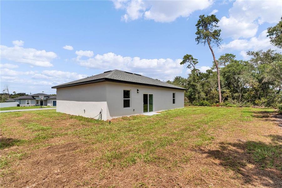 Exterior details and patio area of a home in , Ocala (Image 26).