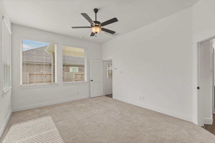 Representative unfurnished interior of a home built from the Rowen by Chesmar Homes in Brookewater 45's, Rosenberg (Image 26).