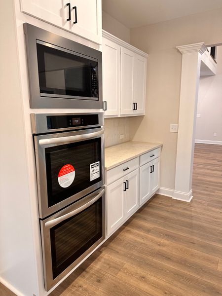 Furnished interior view inside a new home in The Reserve at Red Oaks, Carrollton (Image 6).