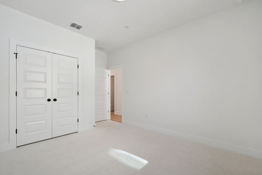 Spacious, unfurnished interior of a new home in Koenig Townhomes, Austin (Image 28).