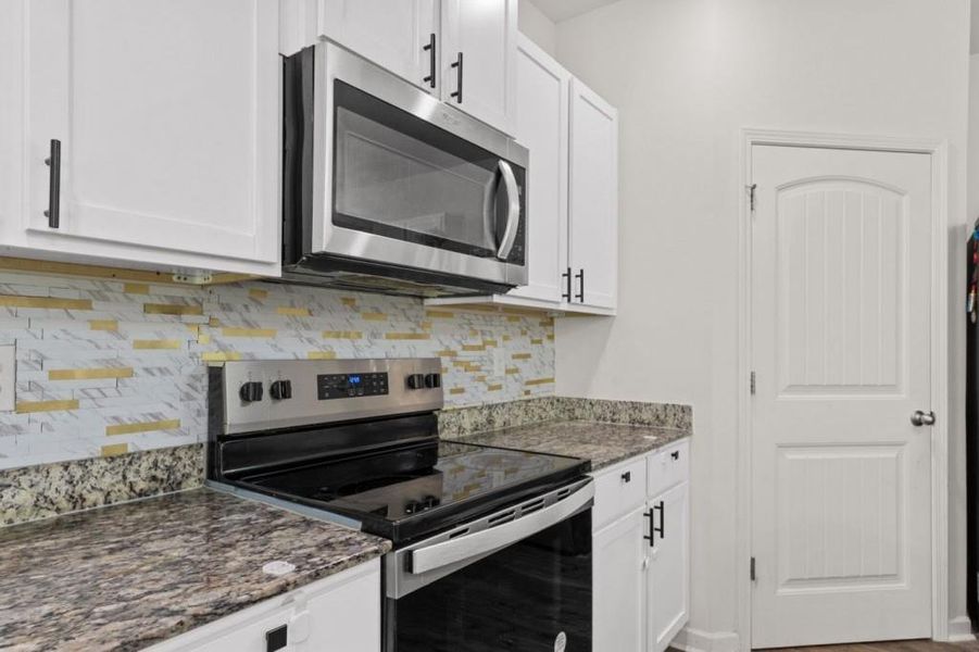 Furnished interior view inside a new home in , Dawsonville (Image 12).