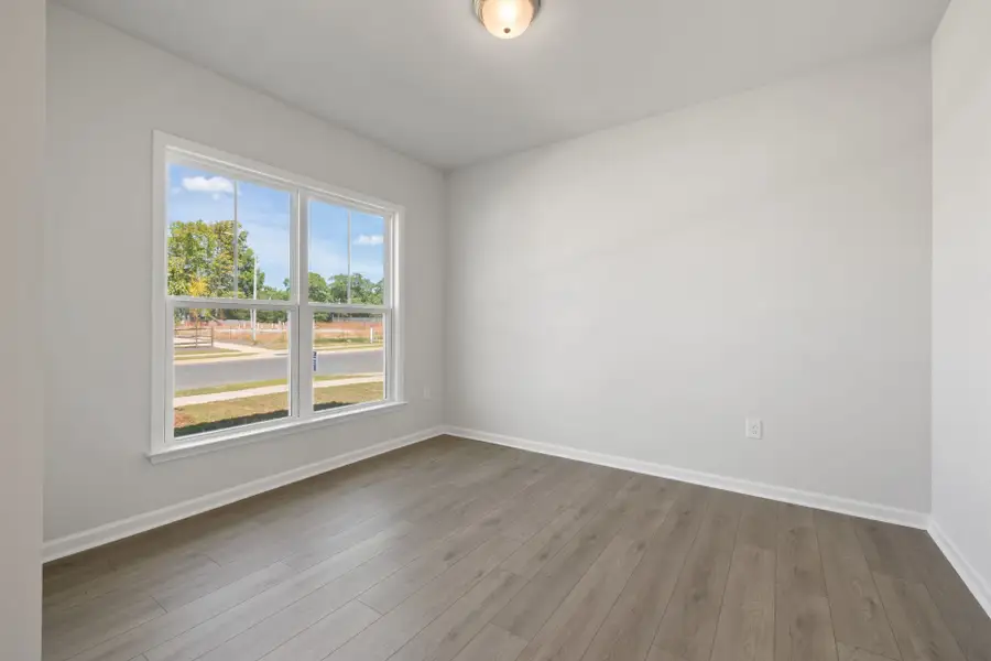 Spacious, unfurnished interior of a new home in Saunders Farm, Willow Spring (Image 26). Spacious, unfurnished interior of a new home in Saunders Farm, Willow Spring (Image 26).