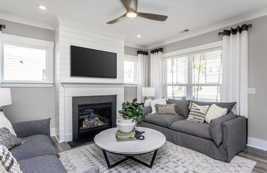 Bright Gathering Room. Model Home Representation.