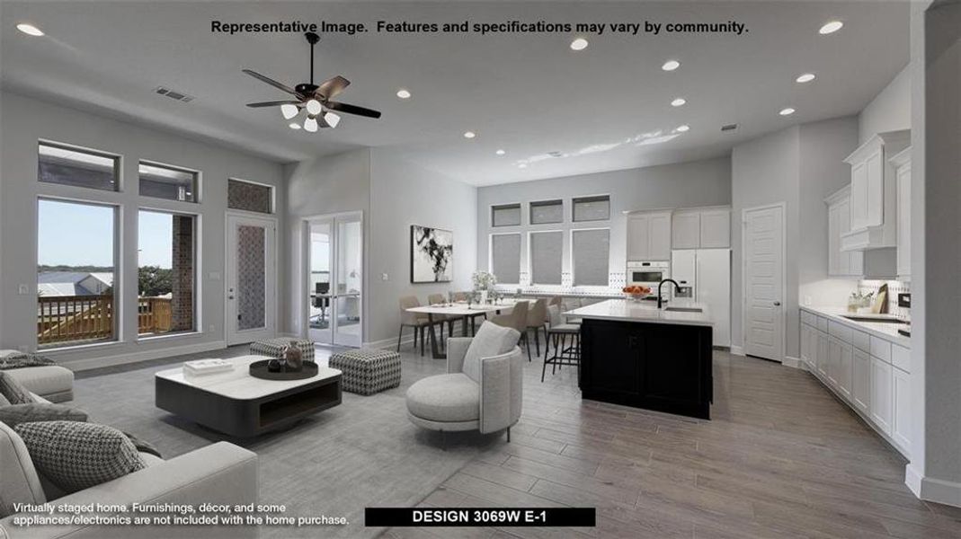 Living room featuring ceiling fan and light hardwood / wood-style flooring