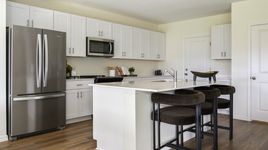 Representative furnished interior of a home built from the Azure by Casa Fresca Homes in Pasadena Woods, Dade City (Image 5).