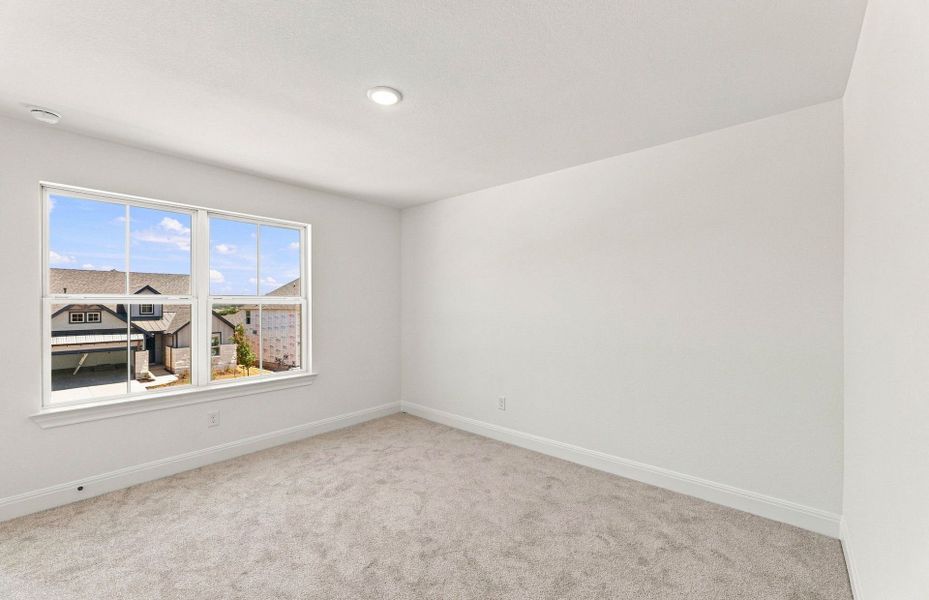 Spacious, unfurnished interior of a new home in Saddleback at Santa Rita Ranch, Liberty Hill (Image 54).