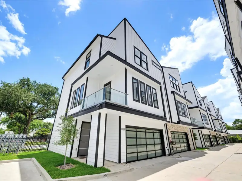 Front exterior of a new home in , Houston, TX, highlighting curb appeal (Image 1). Front exterior of a new home in , Houston, TX, highlighting curb appeal (Image 1).