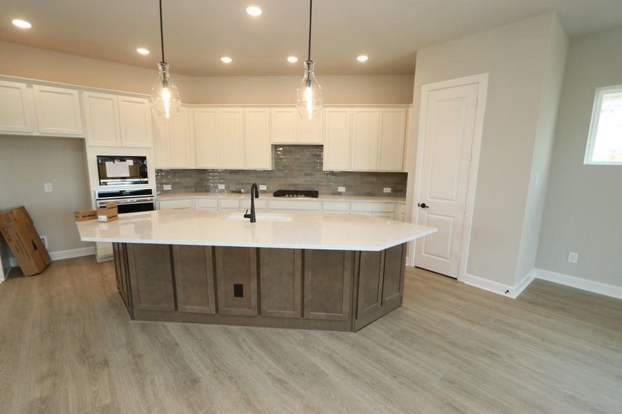 Furnished interior view inside a new home in Riceland 50’ Alley Load Homesites, Mont Belvieu (Image 10).