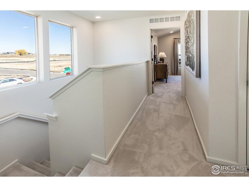 Spacious, unfurnished interior of a new home in Prairie Song Story Collection - Single Family Homes, Windsor (Image 20).