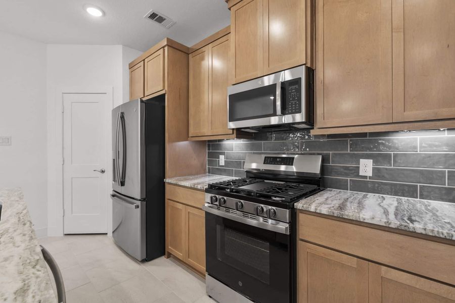 Furnished interior view inside a new home in Meridiana, Manvel (Image 8).