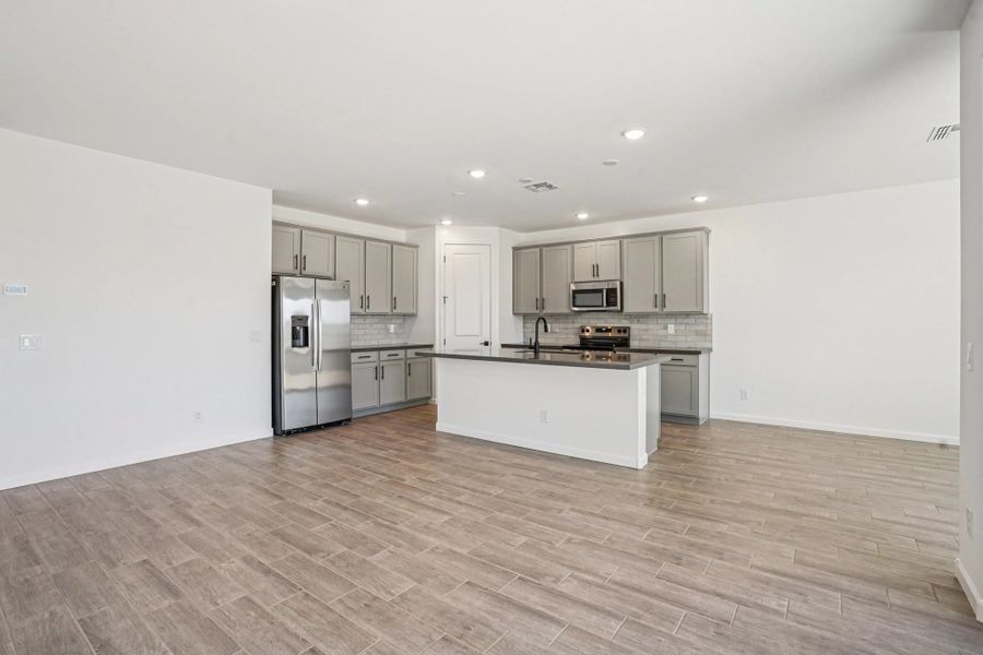 Great room and kitchen Great room and kitchen