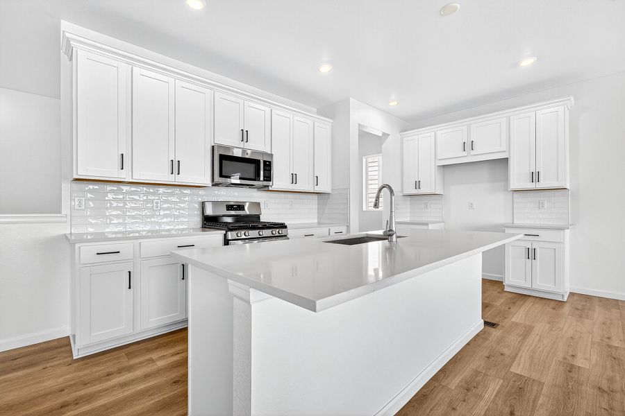 Furnished interior view inside a new home in Trailstone, Arvada (Image 5).