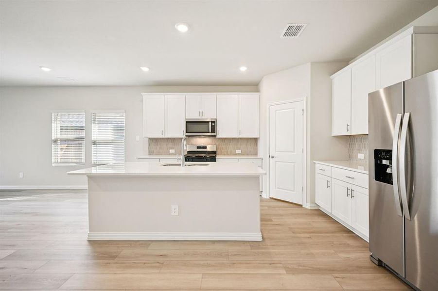 Furnished interior view inside a new home in Eastridge - Signature Series, McKinney (Image 7).