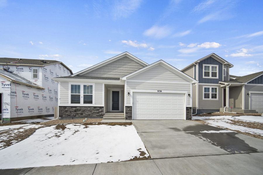 Representative exterior photo of a completed home built from the Lilac by View Homes in Peaceful Ridge, Colorado Springs, CO (Image 1). Representative exterior photo of a completed home built from the Lilac by View Homes in Peaceful Ridge, Colorado Springs, CO (Image 1).