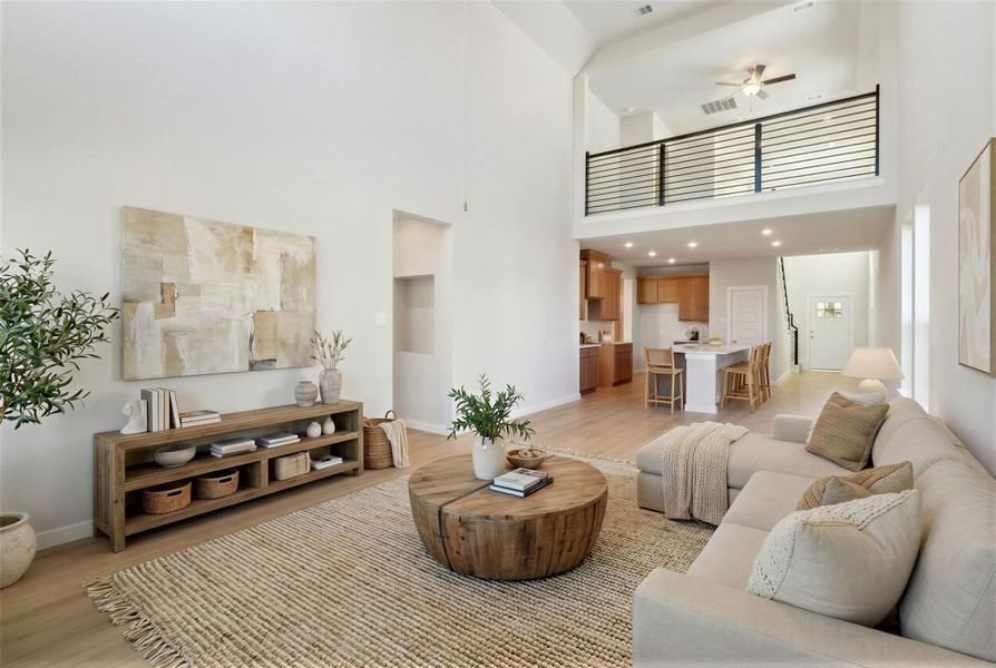 Virtually staged representation of the family room. Representative Photo. Not Actual Home. Colors and features may vary.