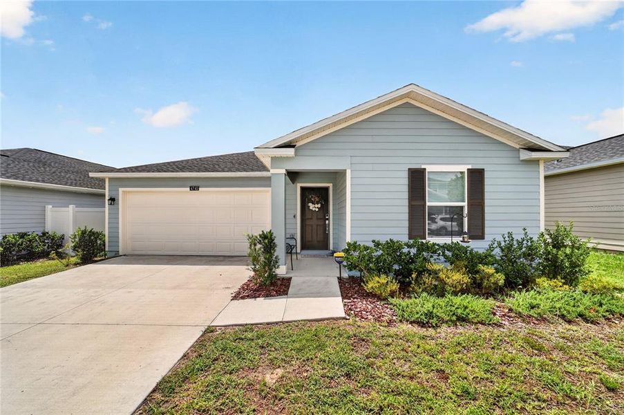 Front exterior of a new home in Marion Ranch, Ocala, FL, highlighting curb appeal (Image 23). Front exterior of a new home in Marion Ranch, Ocala, FL, highlighting curb appeal (Image 23).
