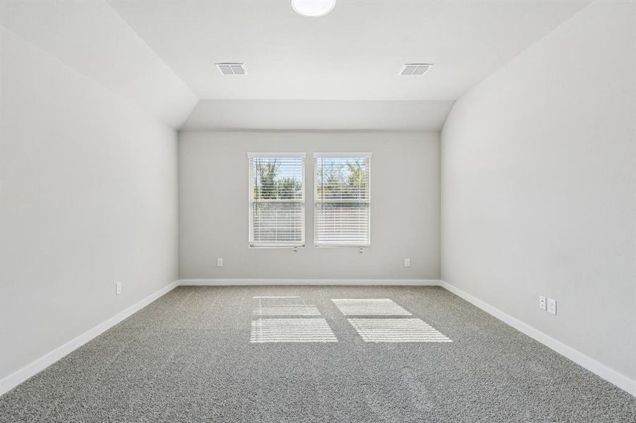 Primary Suite in the Heisman home plan by Trophy Signature Homes – REPRESENTATIVE PHOTO Primary Suite in the Heisman home plan by Trophy Signature Homes – REPRESENTATIVE PHOTO