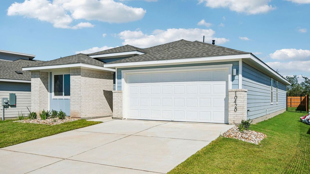 Front exterior of a new home in Trails at Wildhorse, Austin, TX, highlighting curb appeal (Image 2).