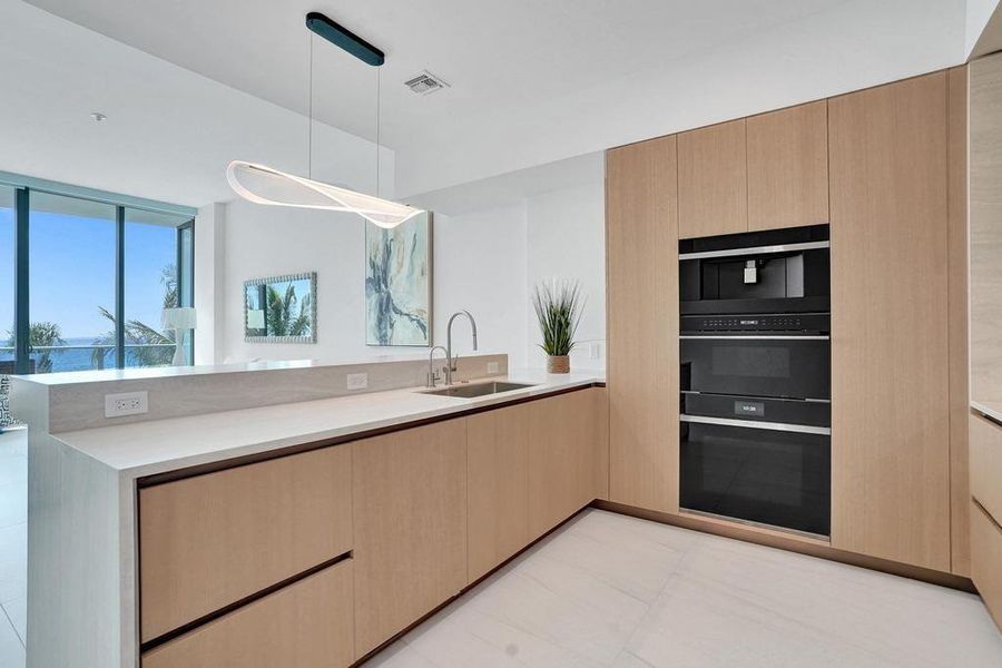 Furnished interior view inside a new home in Casamar, Pompano Beach (Image 8).