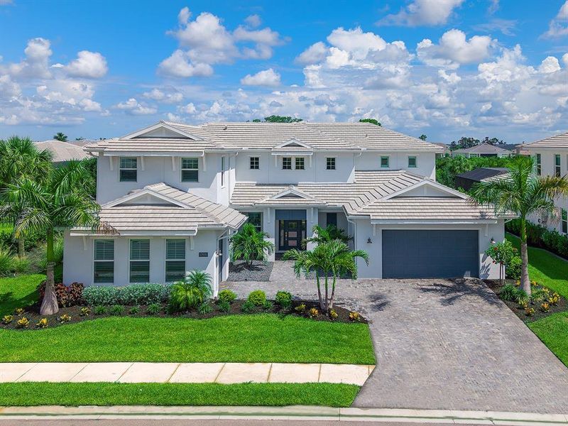 Front exterior of a new home in , Bradenton, FL, highlighting curb appeal (Image 1). Front exterior of a new home in , Bradenton, FL, highlighting curb appeal (Image 1).