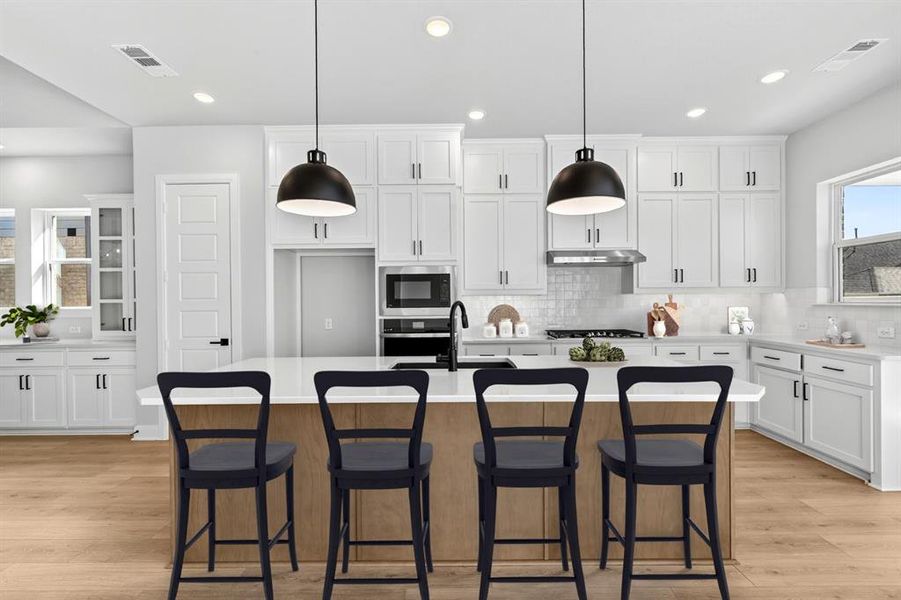Furnished interior view inside a new home in Pecan Square - Gardens, Northlake (Image 11). Furnished interior view inside a new home in Pecan Square - Gardens, Northlake (Image 11).
