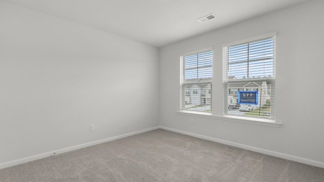 Spacious, unfurnished interior of a new home in Pine Hills Townhomes at Cane Bay, Summerville (Image 15).