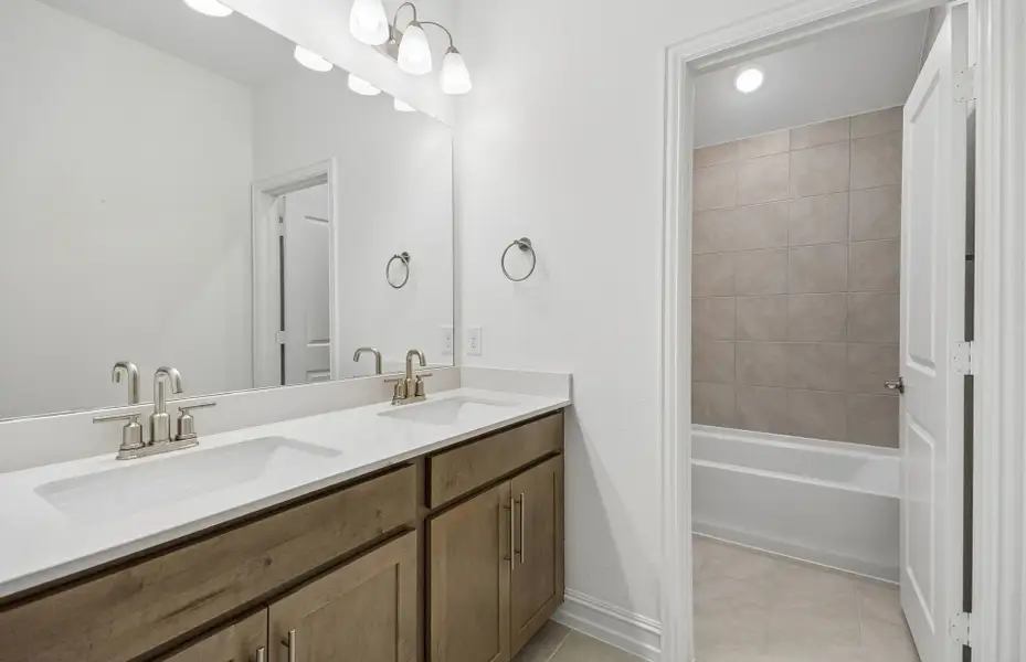 Furnished interior view inside a new home in Highland Lakes, McKinney (Image 6).