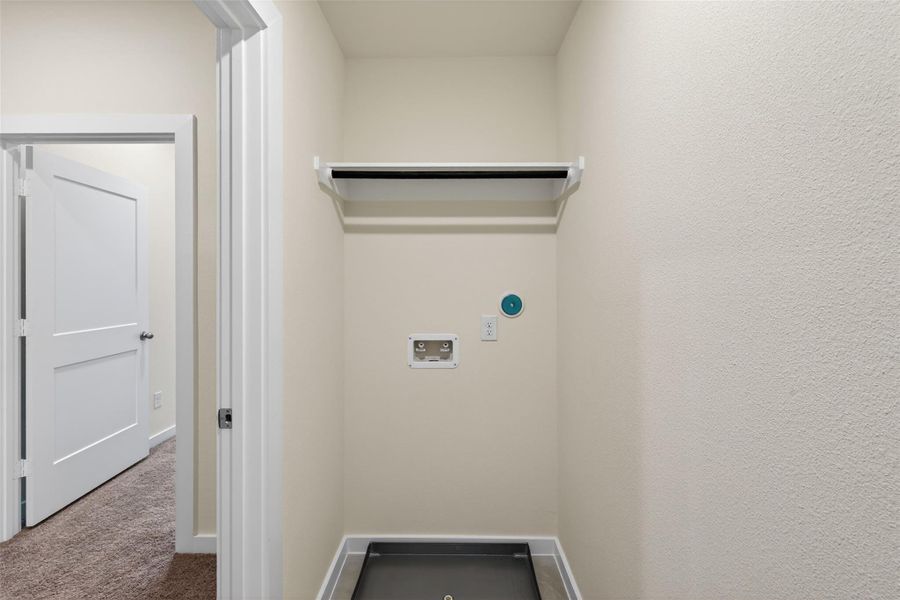 Dedicated laundry space with washer and dryer connections, designed for everyday convenience and efficient functionality. Dedicated laundry space with washer and dryer connections, designed for everyday convenience and efficient functionality.