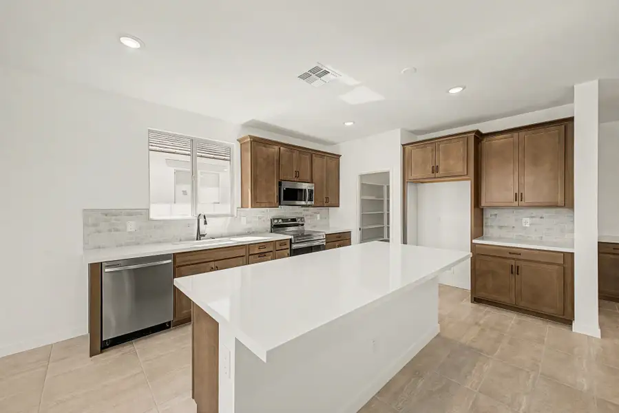 Furnished interior view inside a new home in The Villages at North Copper Canyon, Surprise (Image 4).