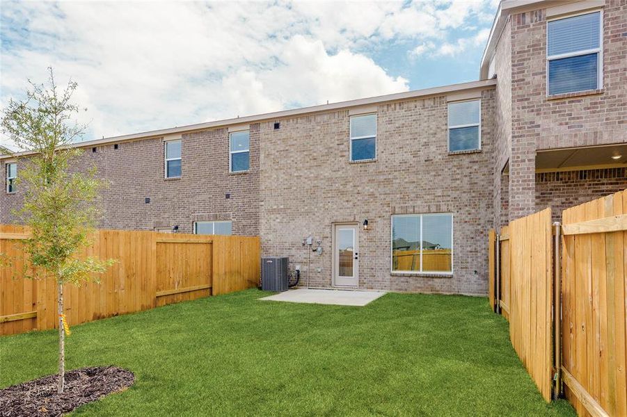 This is an example of the backyard at 726 Carson Lane. All backyards are fenced, landscaped, and have a concrete patio. This is an example of the backyard at 726 Carson Lane. All backyards are fenced, landscaped, and have a concrete patio.