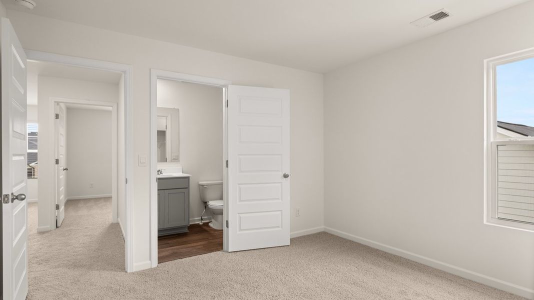 Representative unfurnished interior of a home built from the Hanover by D.R. Horton in The Reserve at Calcutta, Stockbridge (Image 22).