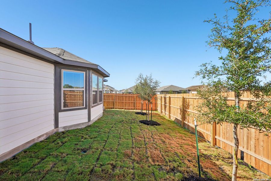 Exterior details and patio area of a home in Remington Ranch, San Antonio (Image 4).