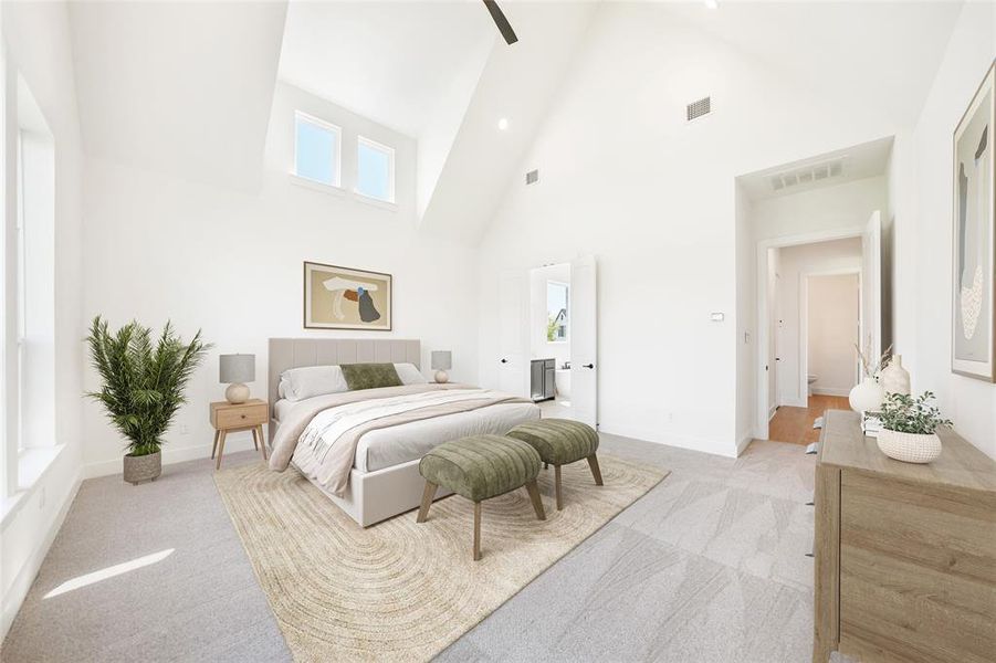 Bedroom featuring light colored carpet, high vaulted ceiling, ensuite bathroom, and ceiling fan